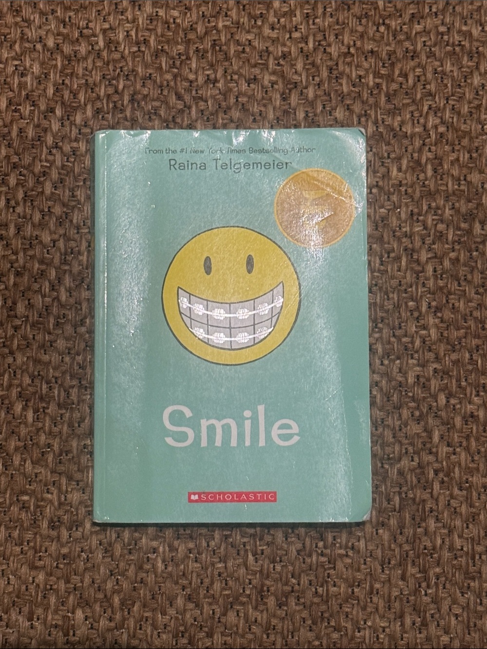 “Smile”—Award-Winning Paperback by NY Times Bestselling Author Raina Telgemeier